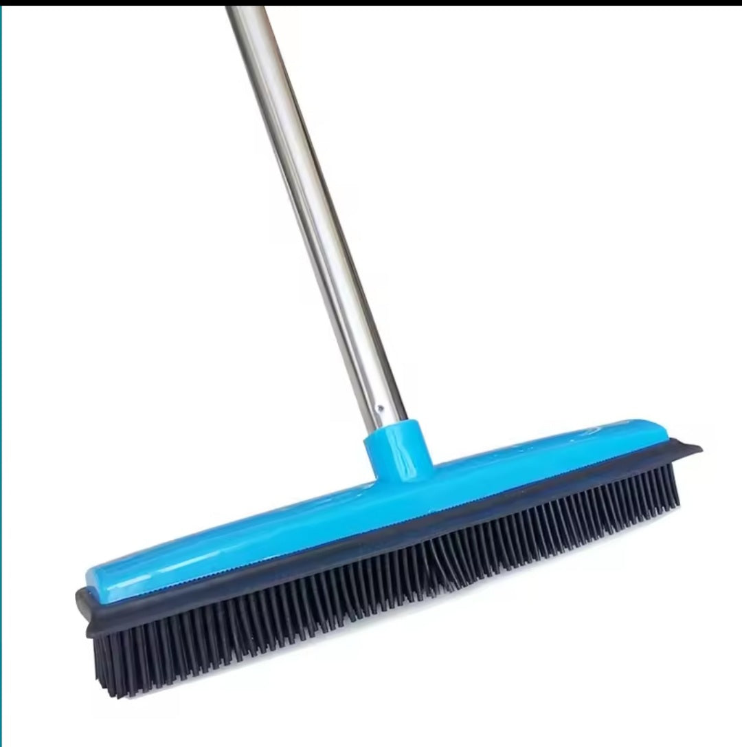 Rubber broom for pet hair and lint removal